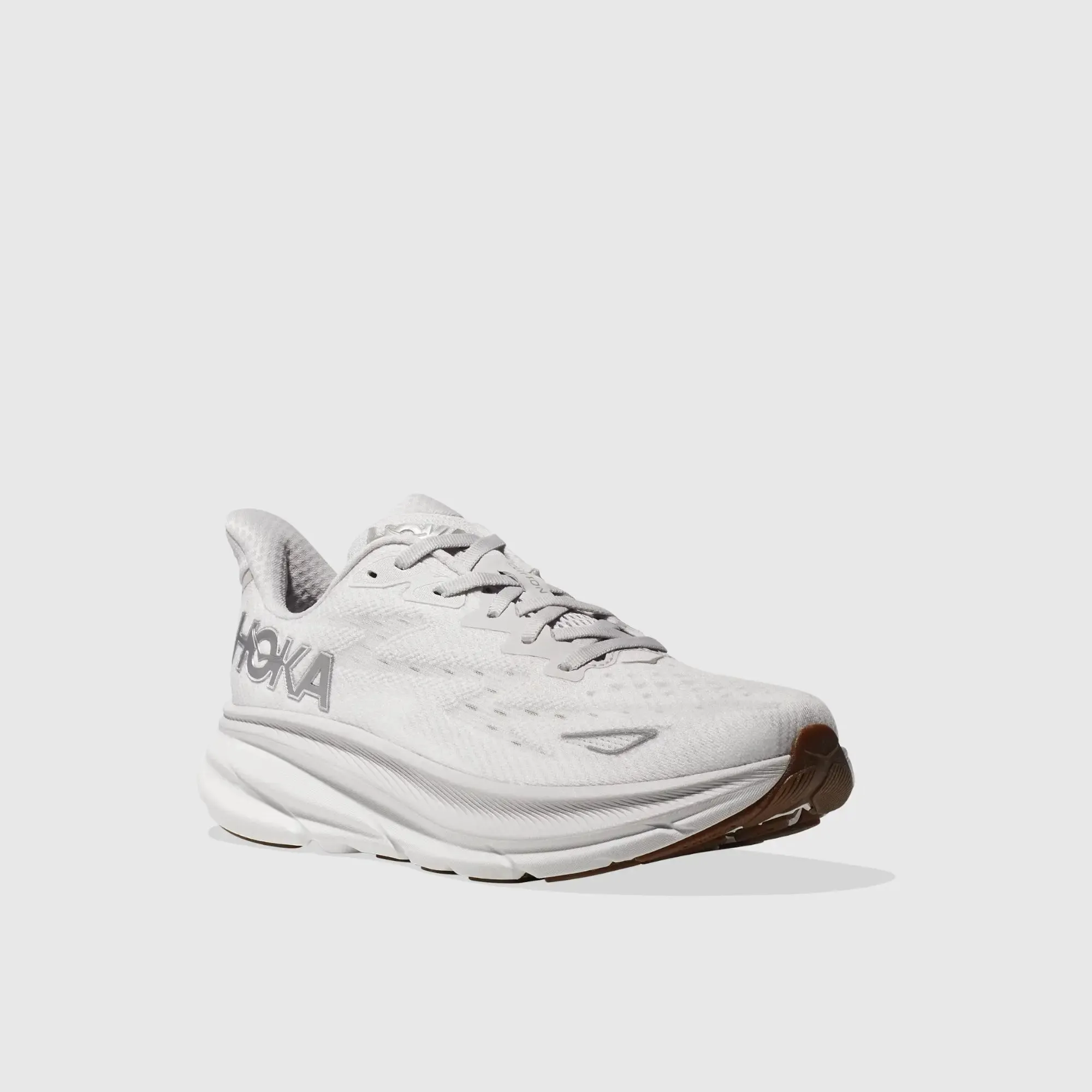 Sure! Here’s an optimized title for the product:

**Hoka Womens Clifton 9 Running Shoes - Nimbus Cloud/White, Lightweight and Comfortable Athletic Footwear**

This title includes the brand, model, color, and highlights key features that attract potential buyers.