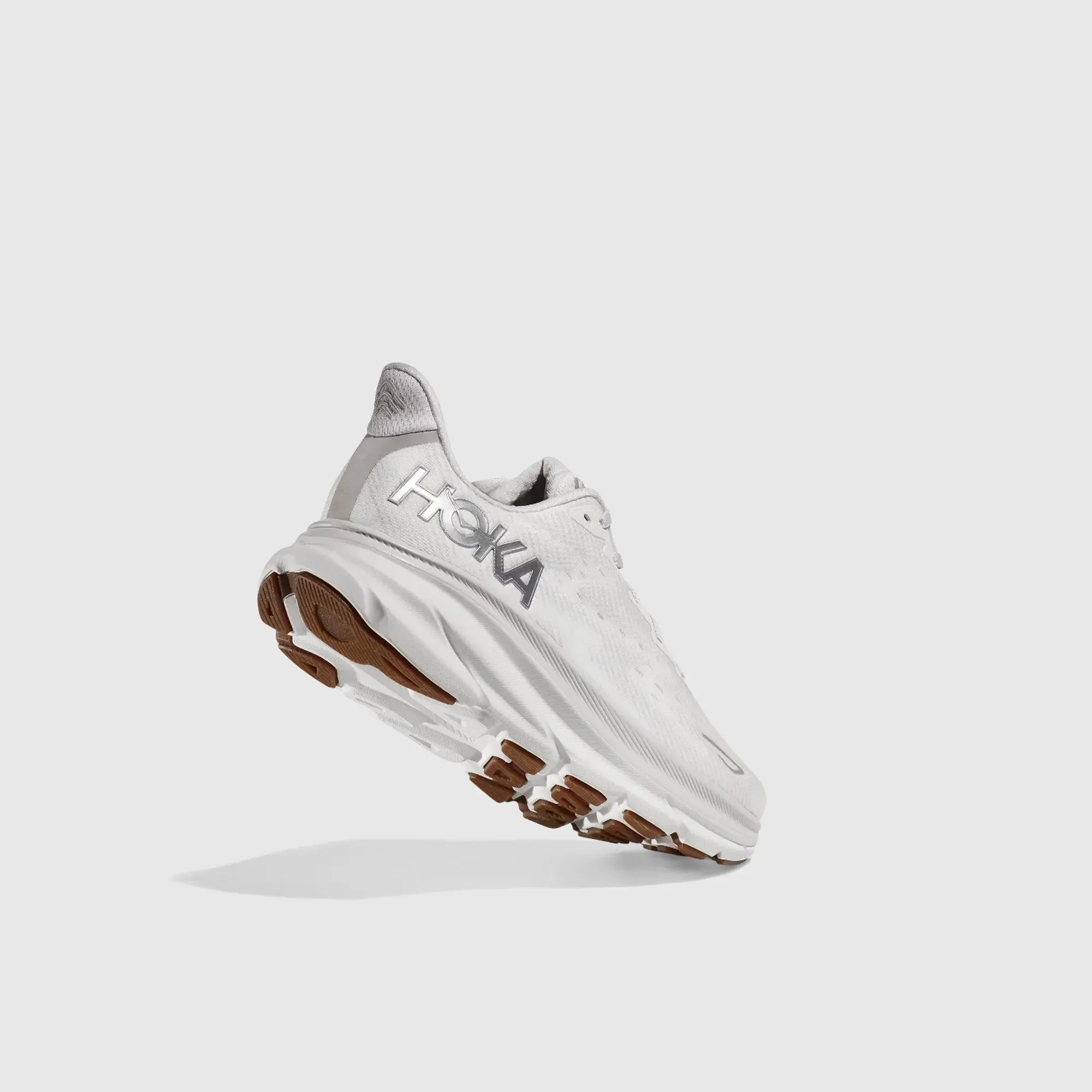 Sure! Here’s an optimized title for the product:

**Hoka Womens Clifton 9 Running Shoes - Nimbus Cloud/White, Lightweight and Comfortable Athletic Footwear**

This title includes the brand, model, color, and highlights key features that attract potential buyers.