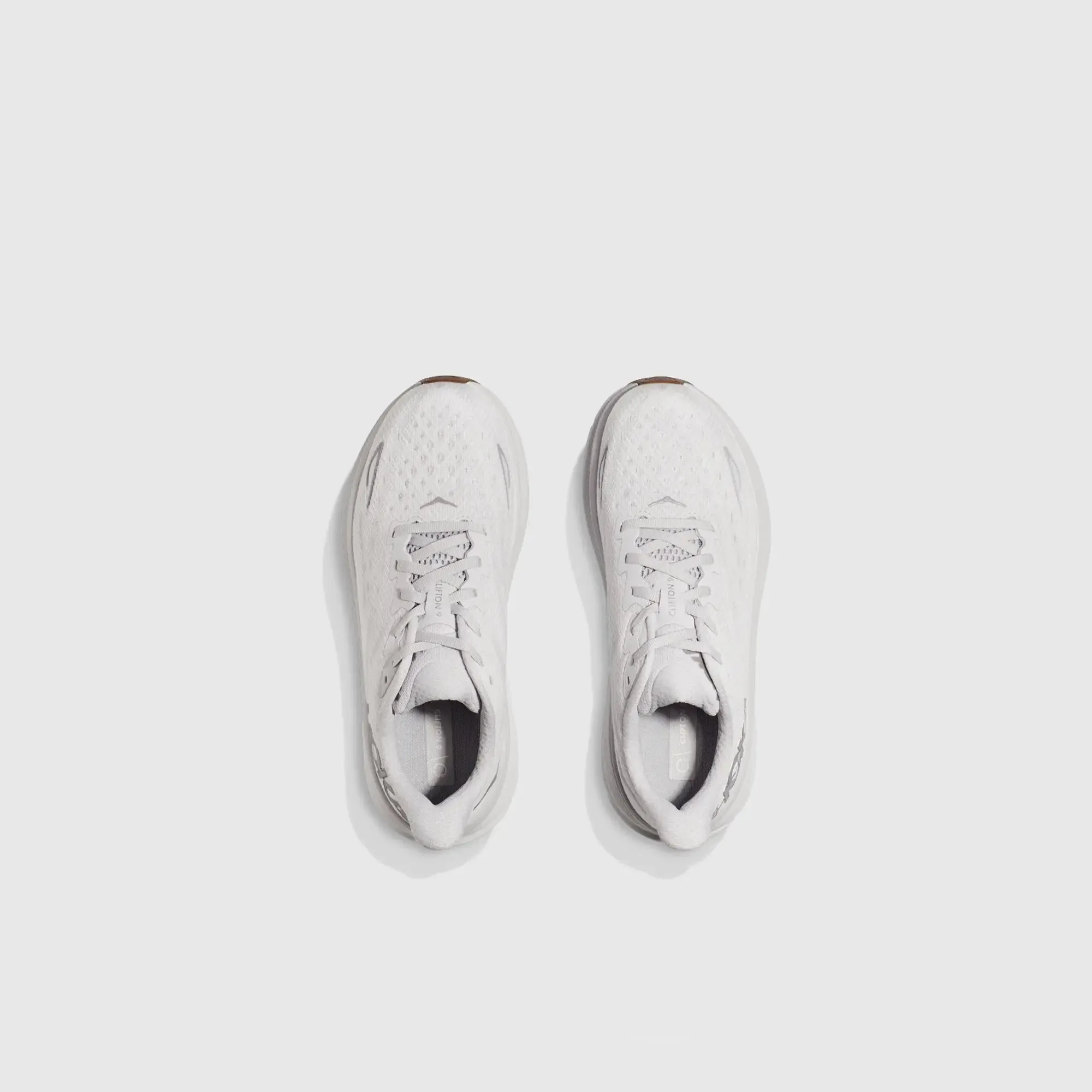 Sure! Here’s an optimized title for the product:

**Hoka Womens Clifton 9 Running Shoes - Nimbus Cloud/White, Lightweight and Comfortable Athletic Footwear**

This title includes the brand, model, color, and highlights key features that attract potential buyers.