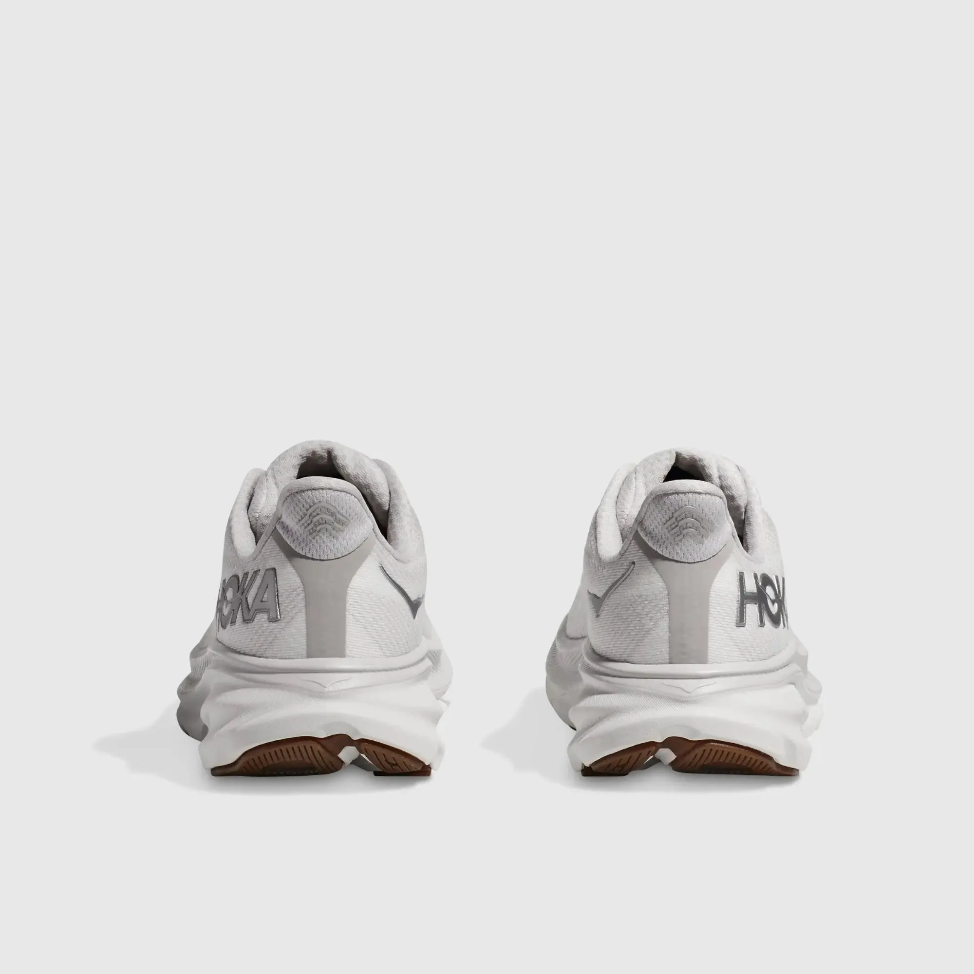 Sure! Here’s an optimized title for the product:

**Hoka Womens Clifton 9 Running Shoes - Nimbus Cloud/White, Lightweight and Comfortable Athletic Footwear**

This title includes the brand, model, color, and highlights key features that attract potential buyers.